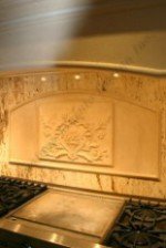 Custom carved tile backsplash